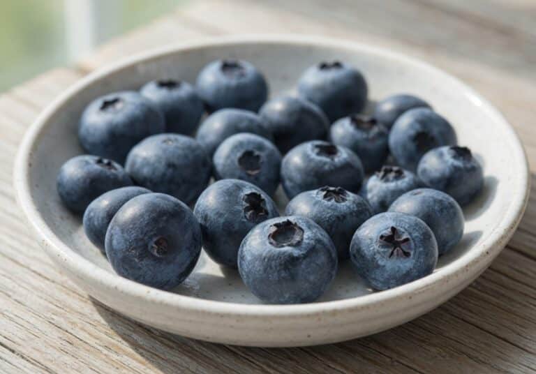 Fresh blueberries in a glass — are blueberries low FODMAP for IBS