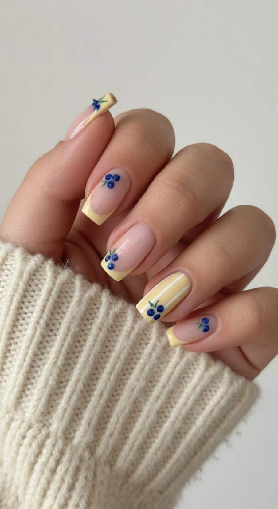 Spring nails minimalist blooms butter yellow