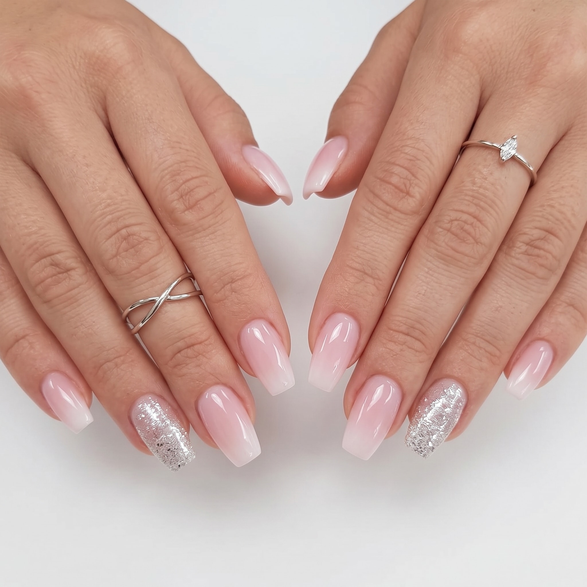 Purple detailed acrylic press-ons with glossy nude bases, soft accents, and almond-shaped tips.