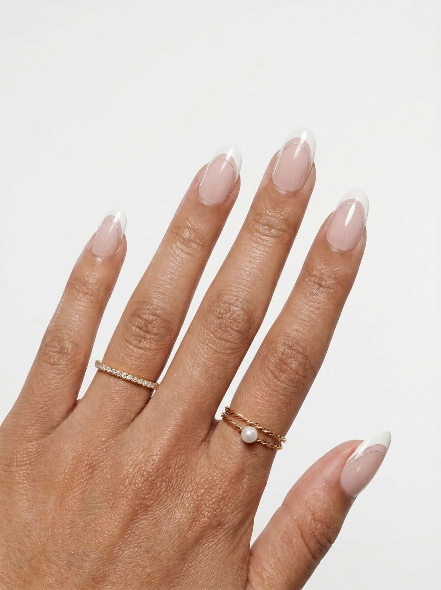 Natural nude nails with ultra-thin white micro French tips