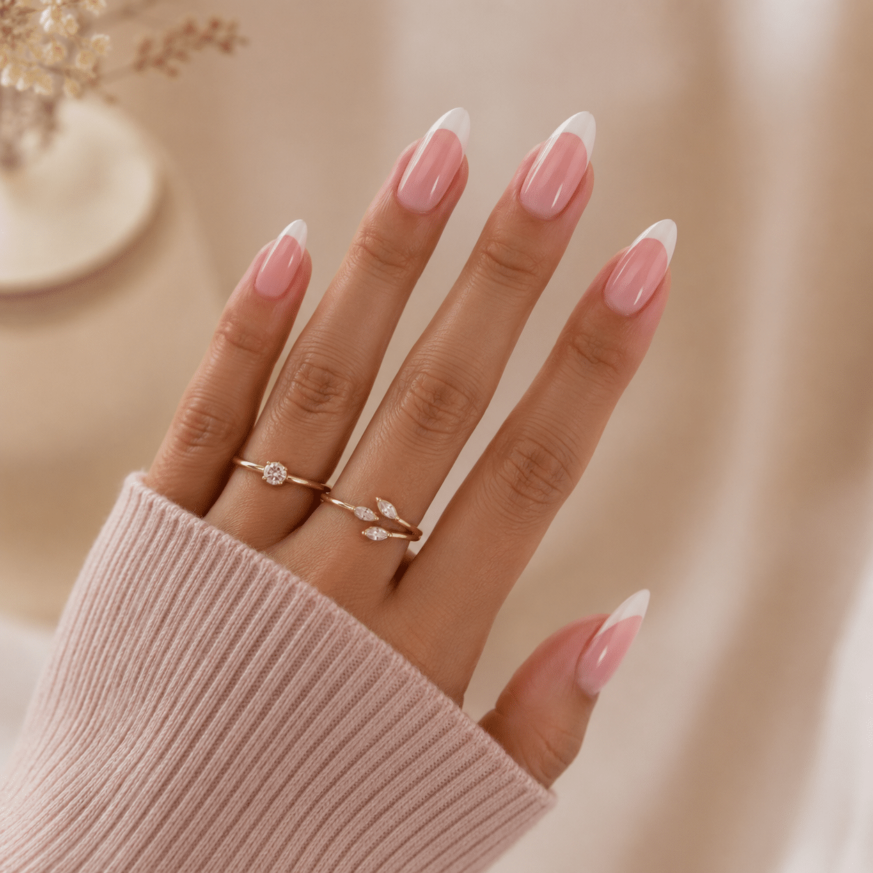 Colored almond French tip nails with soft green tip details.