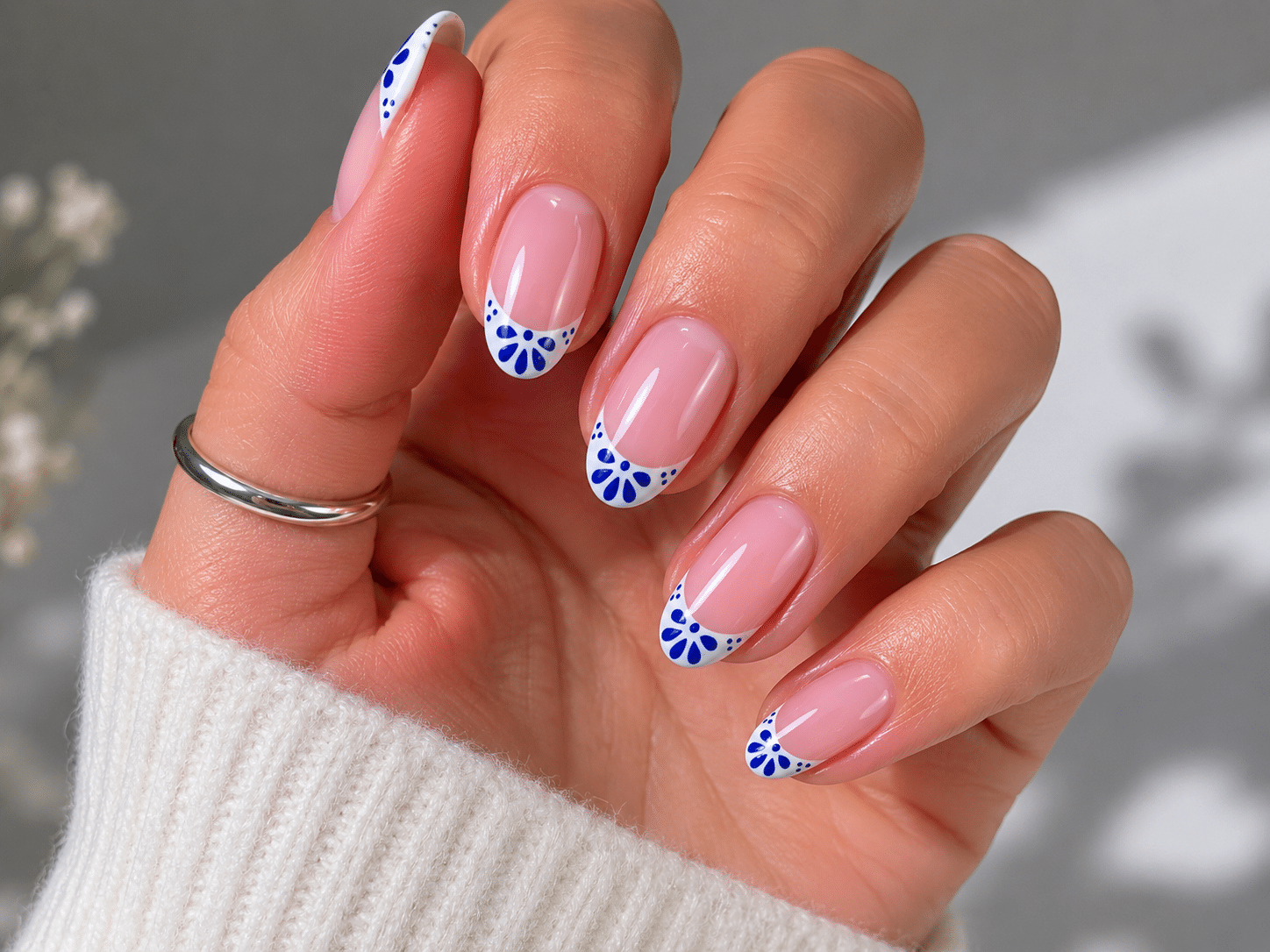 Colorful blue gel French tip nails with a glossy summer finish