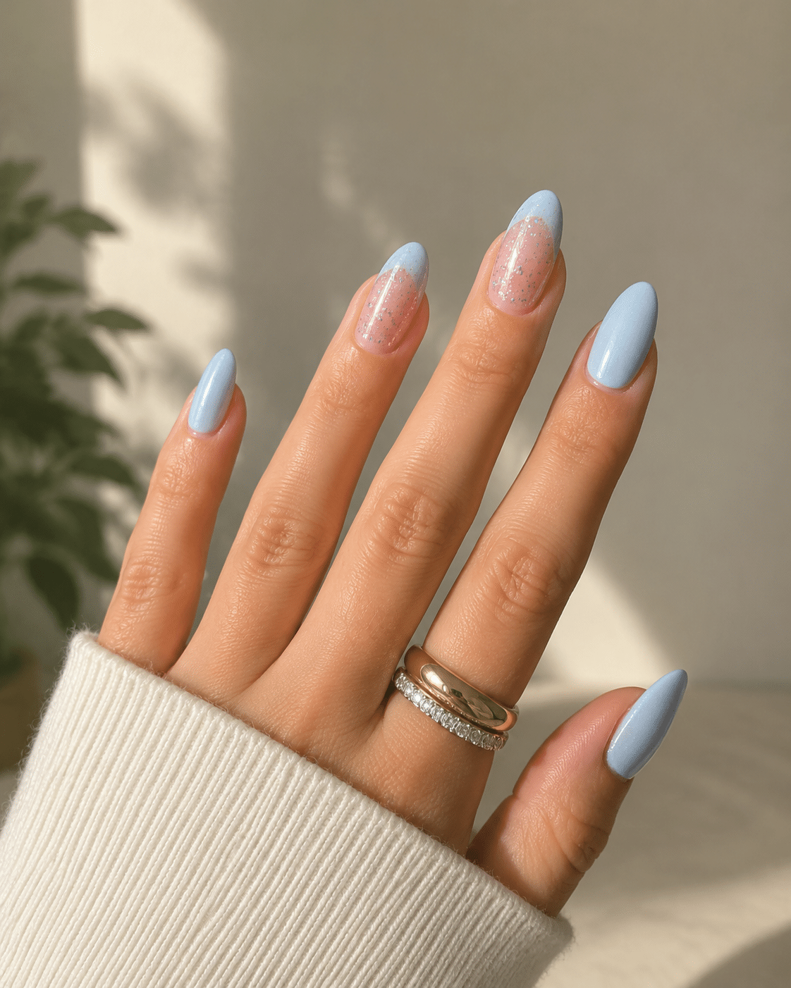 Colorful summer French tips on almond nails with glossy pastel accents