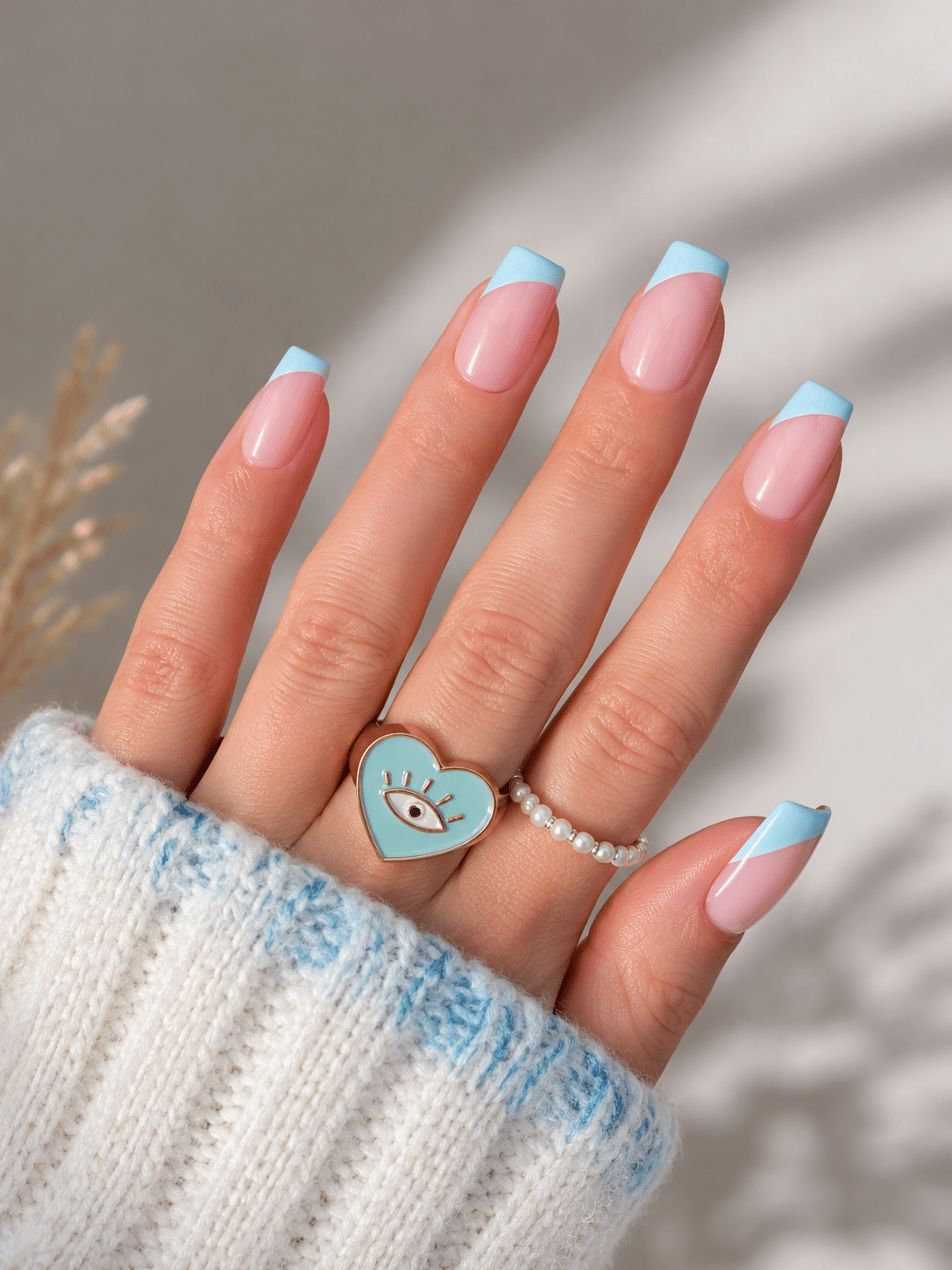 Double gel French tip nails with colorful curved tip lines