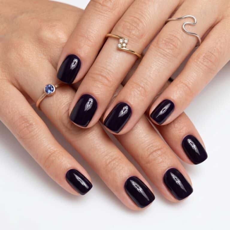Nude extra short square press-ons with a glossy finish and clean everyday shape.