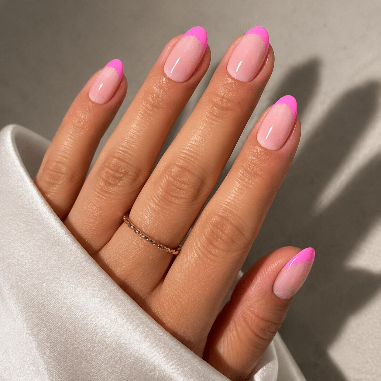 Light pink almond French manicure with soft glossy finish
