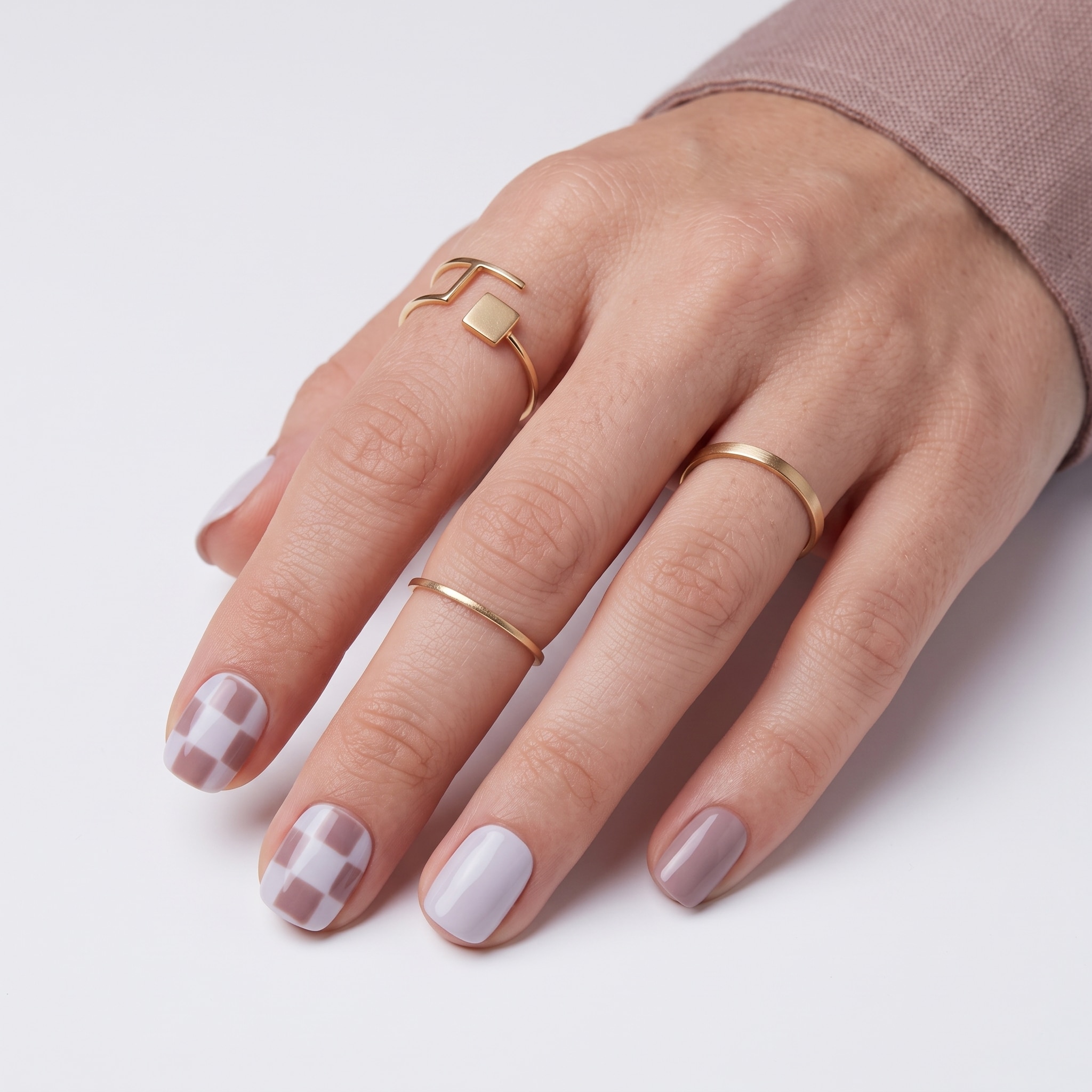 Mauve short nails with delicate floral accent nail art