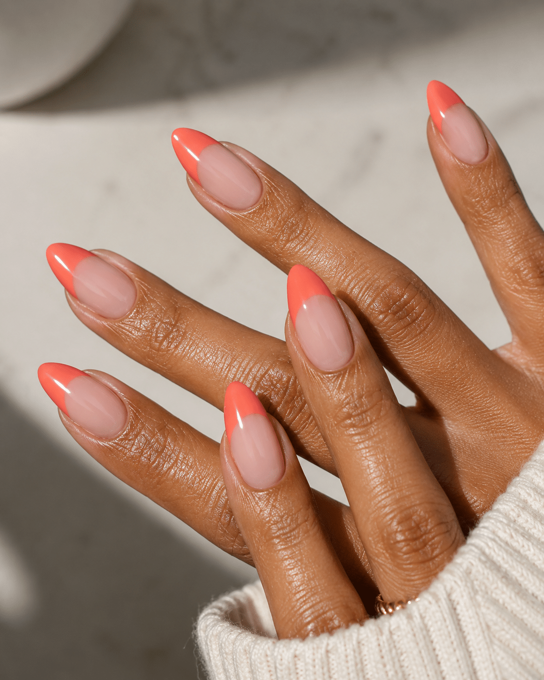 Pink French manicure ideas with bright pink tips and glossy nude polish