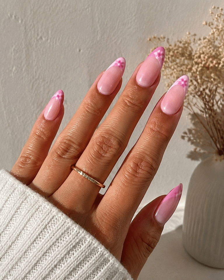 Pink French tip nails with glossy hot pink tips on almond nails