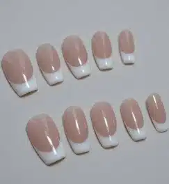 Soft Pink Short French Tip Press On Nails Short pink nails with soft pale pink French tip details.