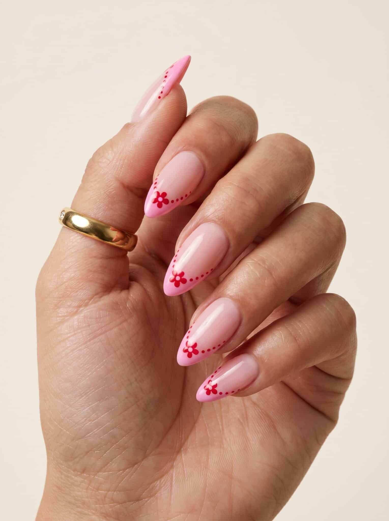 Pastel summer French tip nails with soft green, blue, and pink tips on short nails