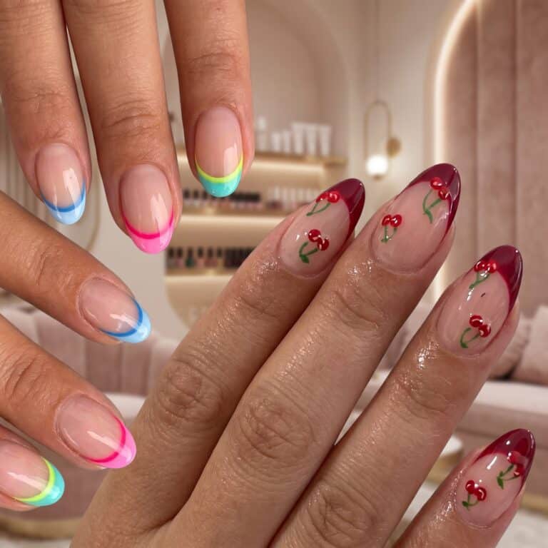 Trendy French Tip Nail Designs for Summer with pastel blue and green French tips on glossy almond nails