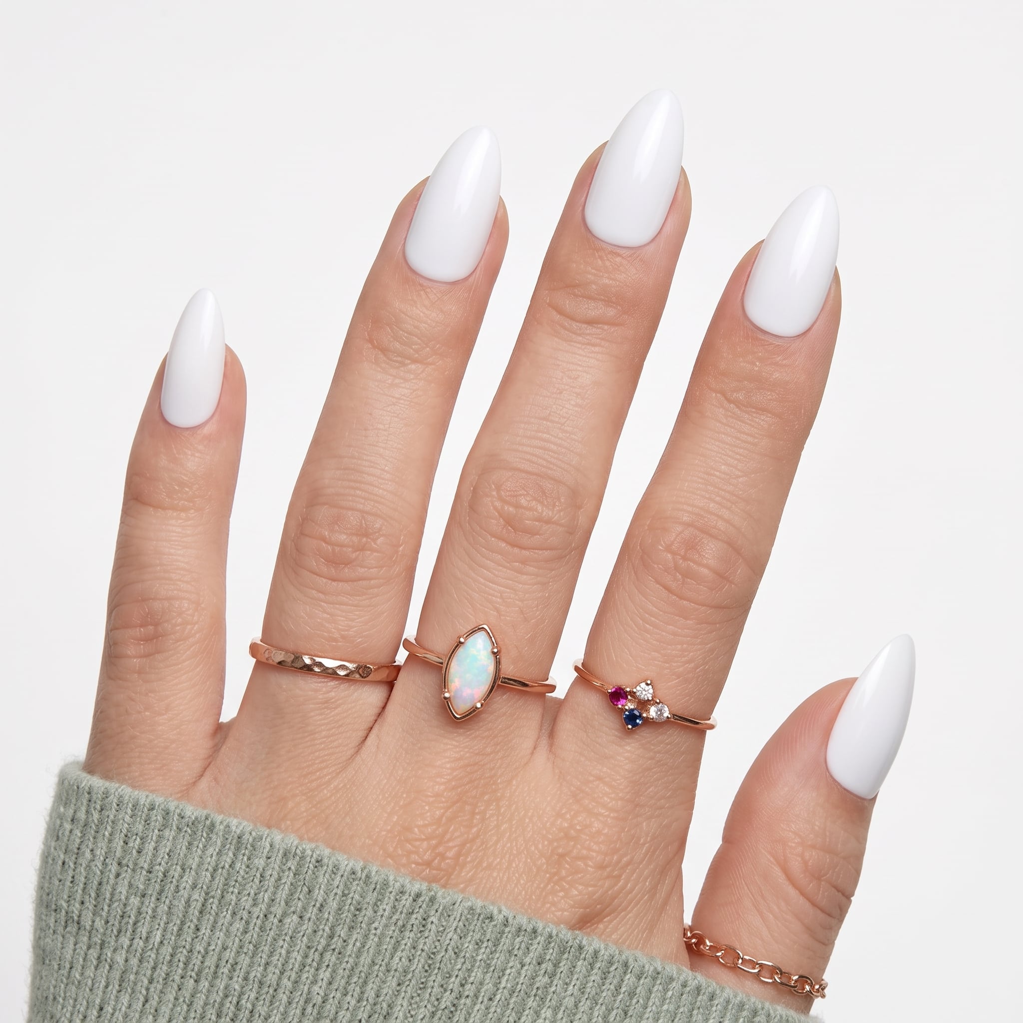 Glossy white press-ons with a beige sleeve and soft rounded square shape.