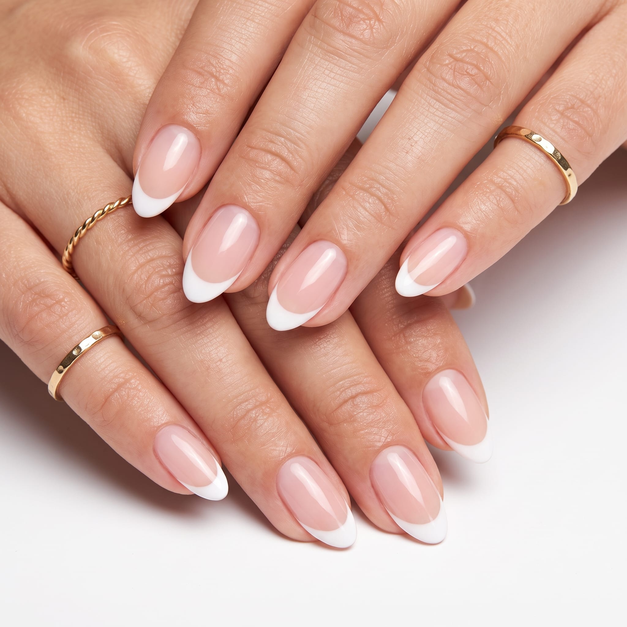 Baby pink natural press-ons with a glossy sheer finish