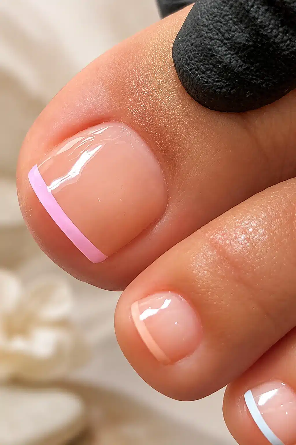 Clear Pink French Tip Toes: Glossy Jelly Pedicure Ideas 8 Big toe close up with clear pink French tip design