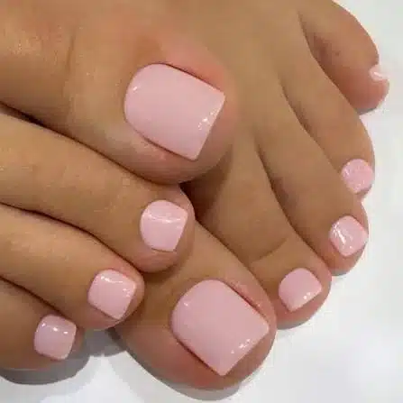 Milky Pink Toes: The Glossy Pedicure That Goes With Everything 3 Close-up of classic sheer milky pink toes