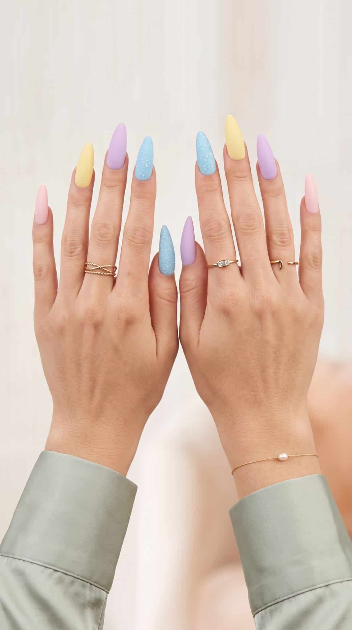 Green press-on nails with a clean glossy finish during an at-home manicure routine