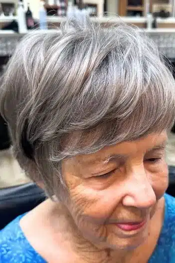 30+ Radiant Short Hairstyles for Women Over 70 With Fine Hair 28 Silver-Glow Feathered Pixie hairstyle