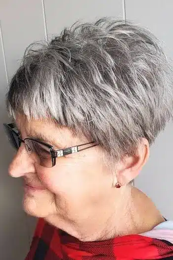Textured Silver Pixie With Cropped Bangs haircut for women over 60