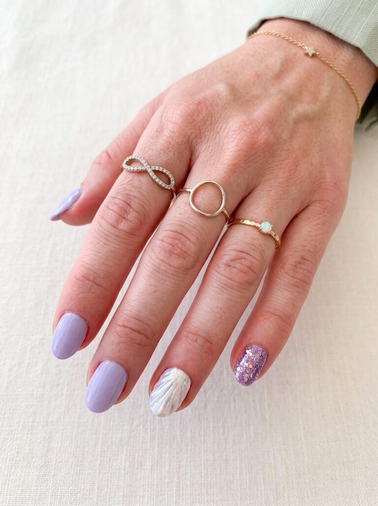 Applying glue to press-on nails to help them last longer