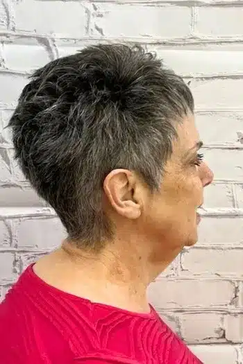 Charcoal Gray Pixie With a Feathered Top haircut for women over 60