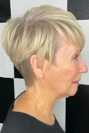 Lightly Choppy Blonde Pixie With Bangs hairstyle