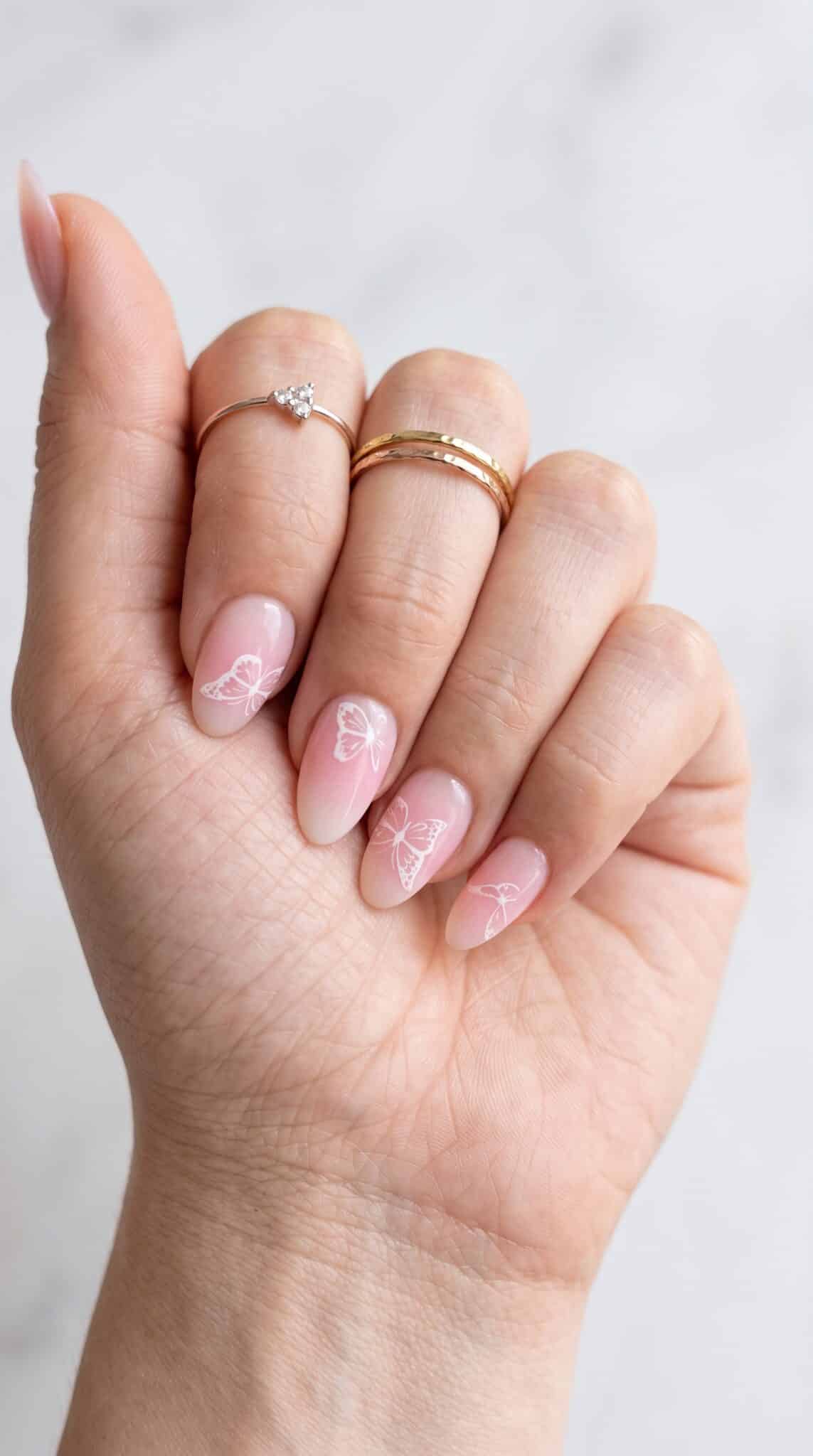 Lifted press-on nail example showing why nails can pop off early