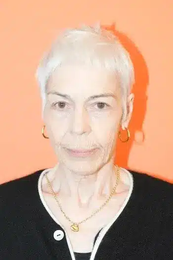 Ultra-Short White Pixie With Baby Bangs haircut for women over 60
