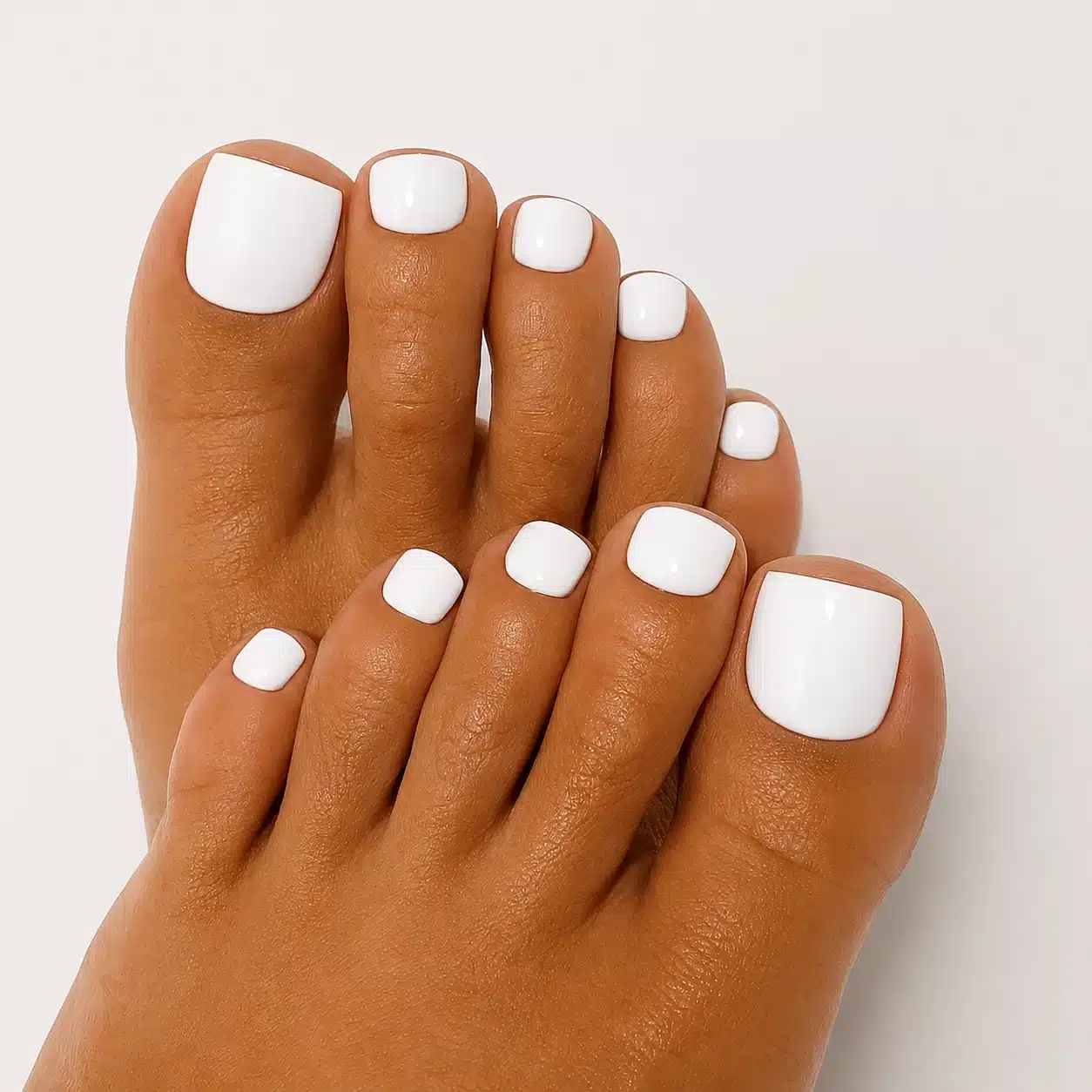 Milky White Acrylic Toes: 10 Clean, Glossy Ideas 1 Milky white acrylic toes with short square glossy nails