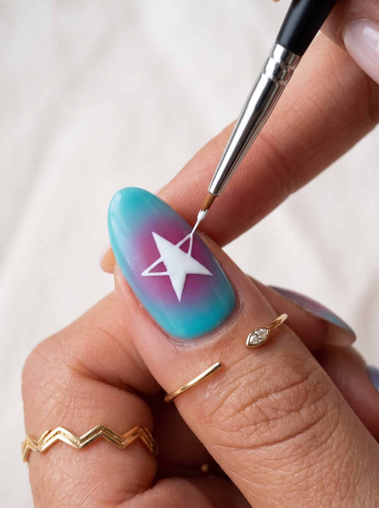 Mint press-on nails with a soft glossy finish during a nail routine