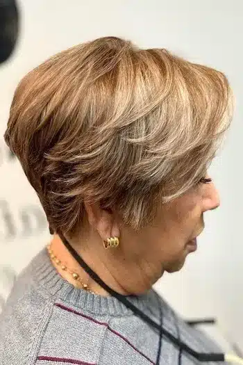 Soft Highlighted Pixie-Bob haircut for women over 60