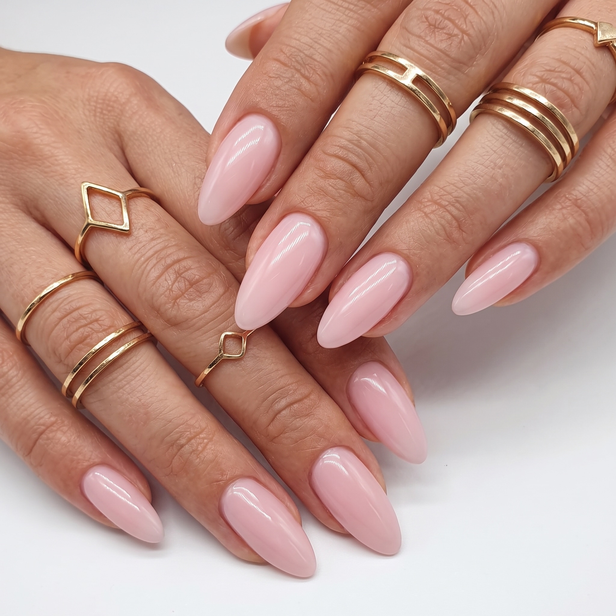 Natural press-on nail mix with nude pink and milky realistic finishes