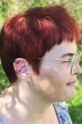 Copper Pixie With Soft Bangs haircut for women over 60