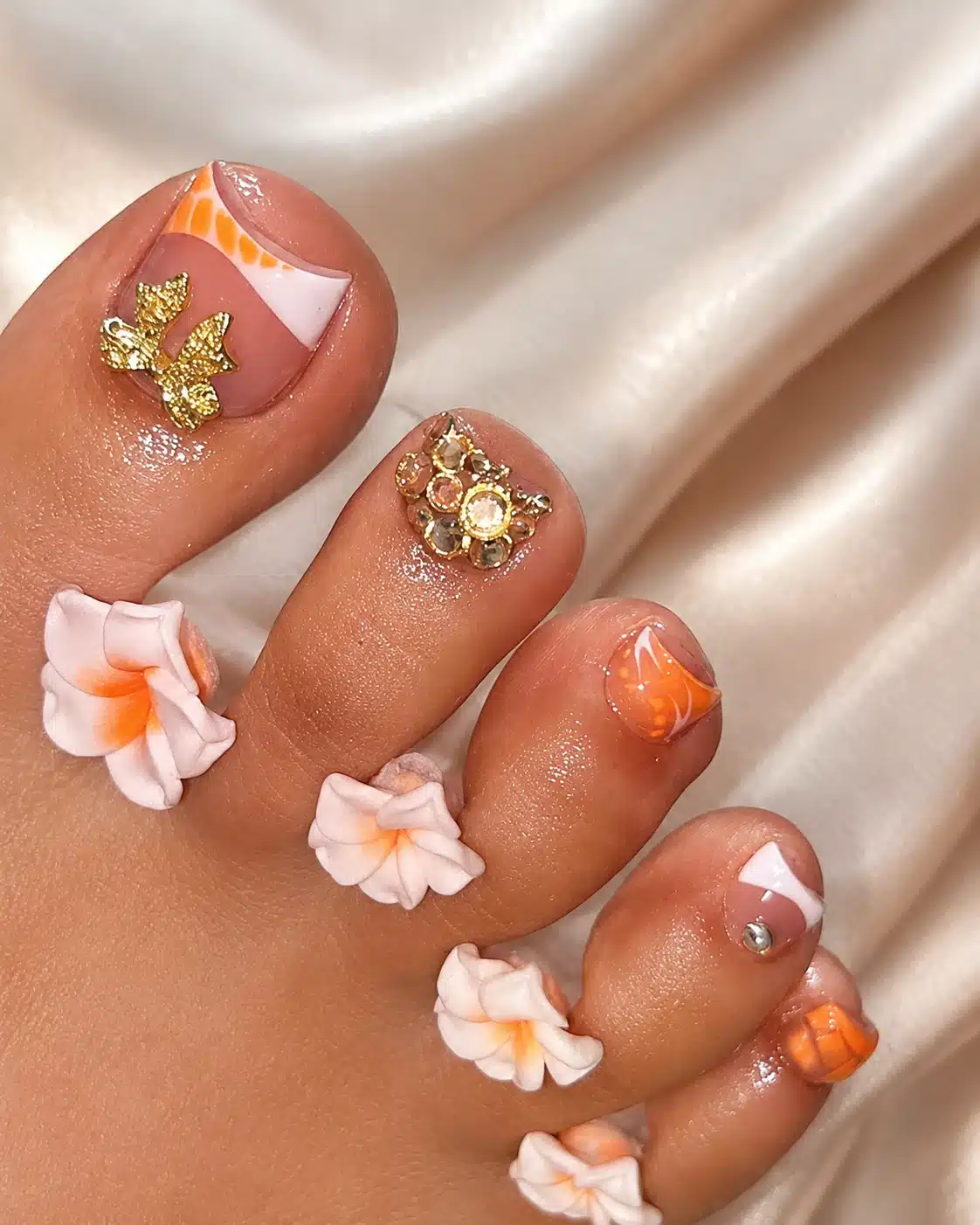 Orange French Tip Toes: Bright Color French Pedicure Ideas 8 Orange French pedicure with flower detail