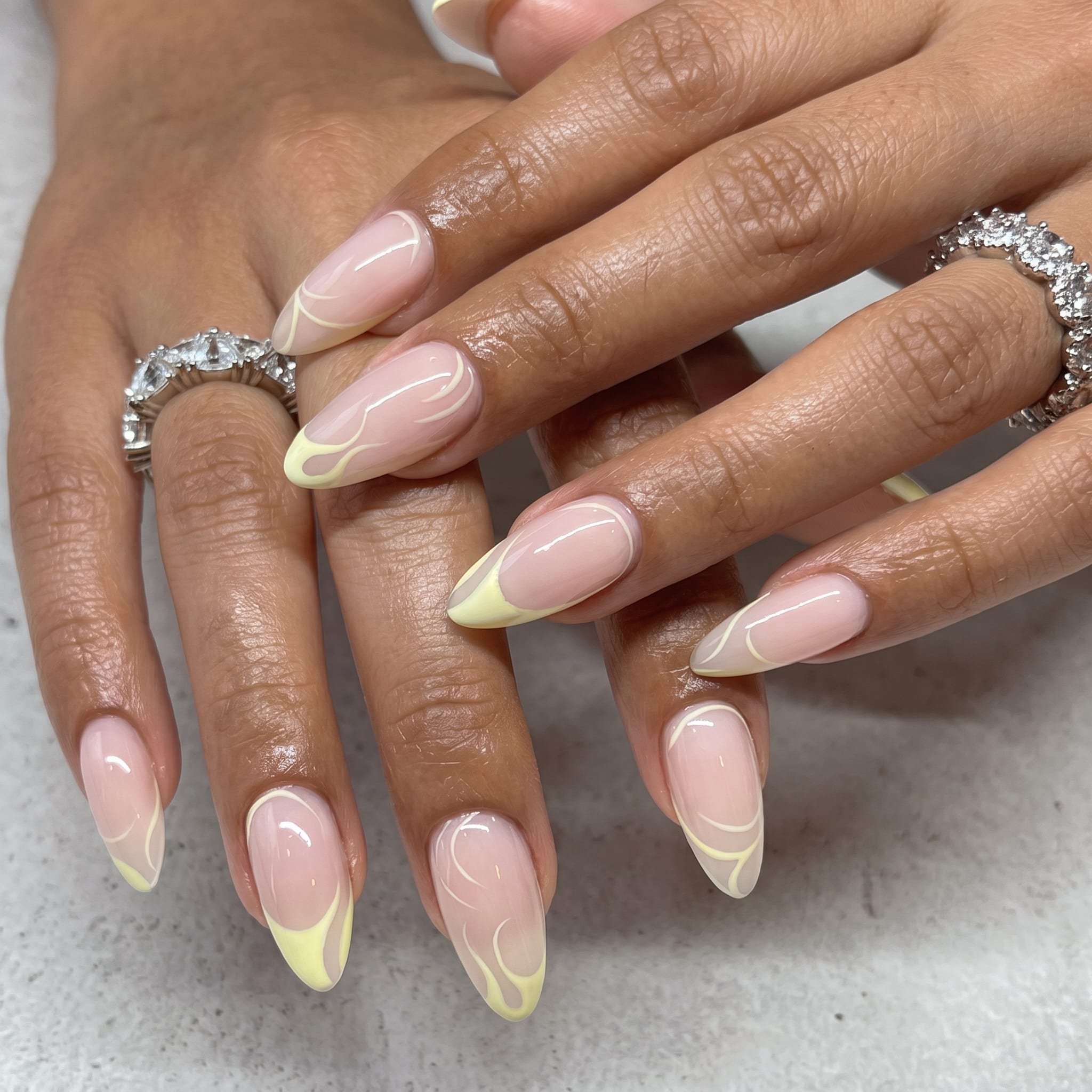 aqua blue french tips with glossy nude base and beachy summer finish