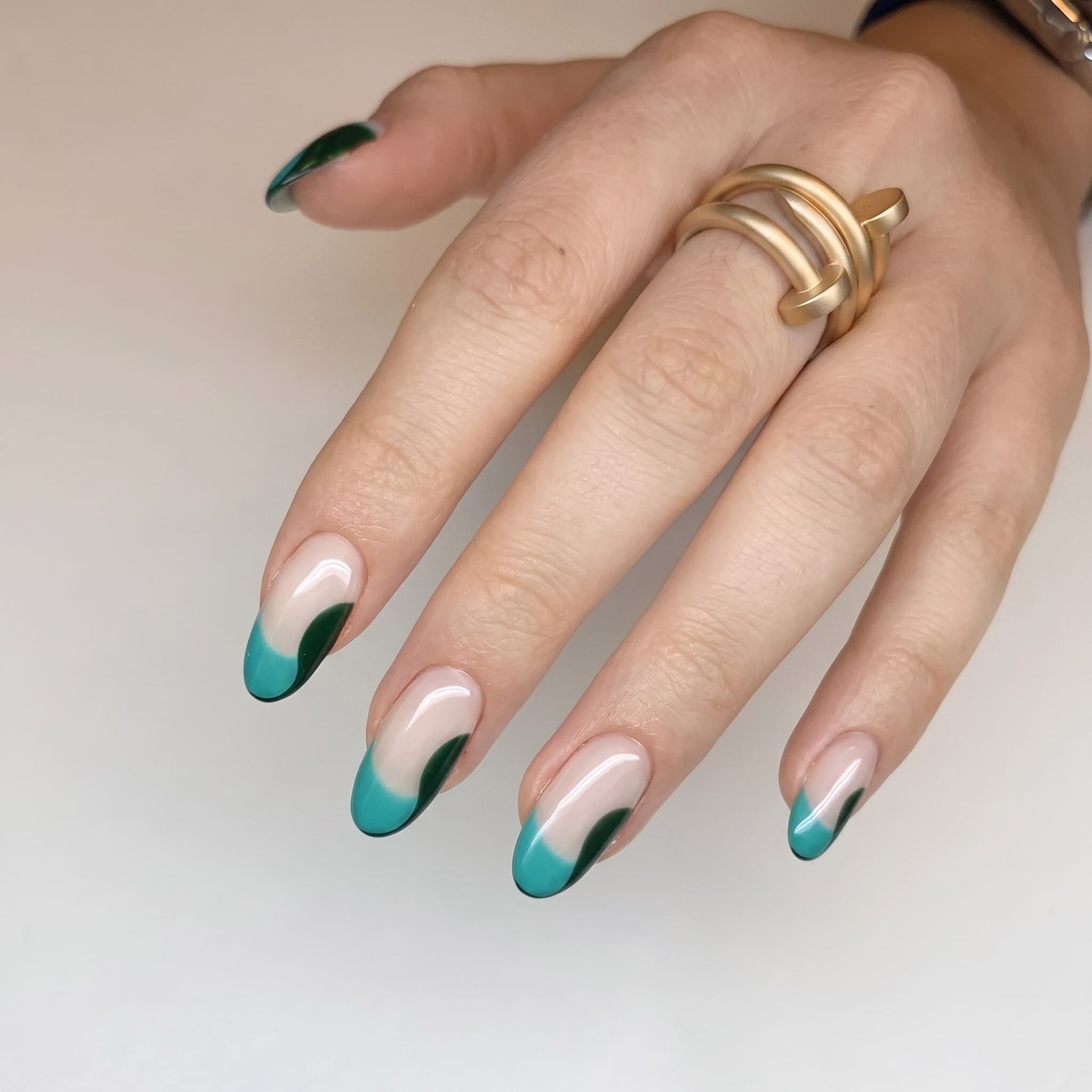 blue seashell french tip nails with glossy nude base and beach nail art
