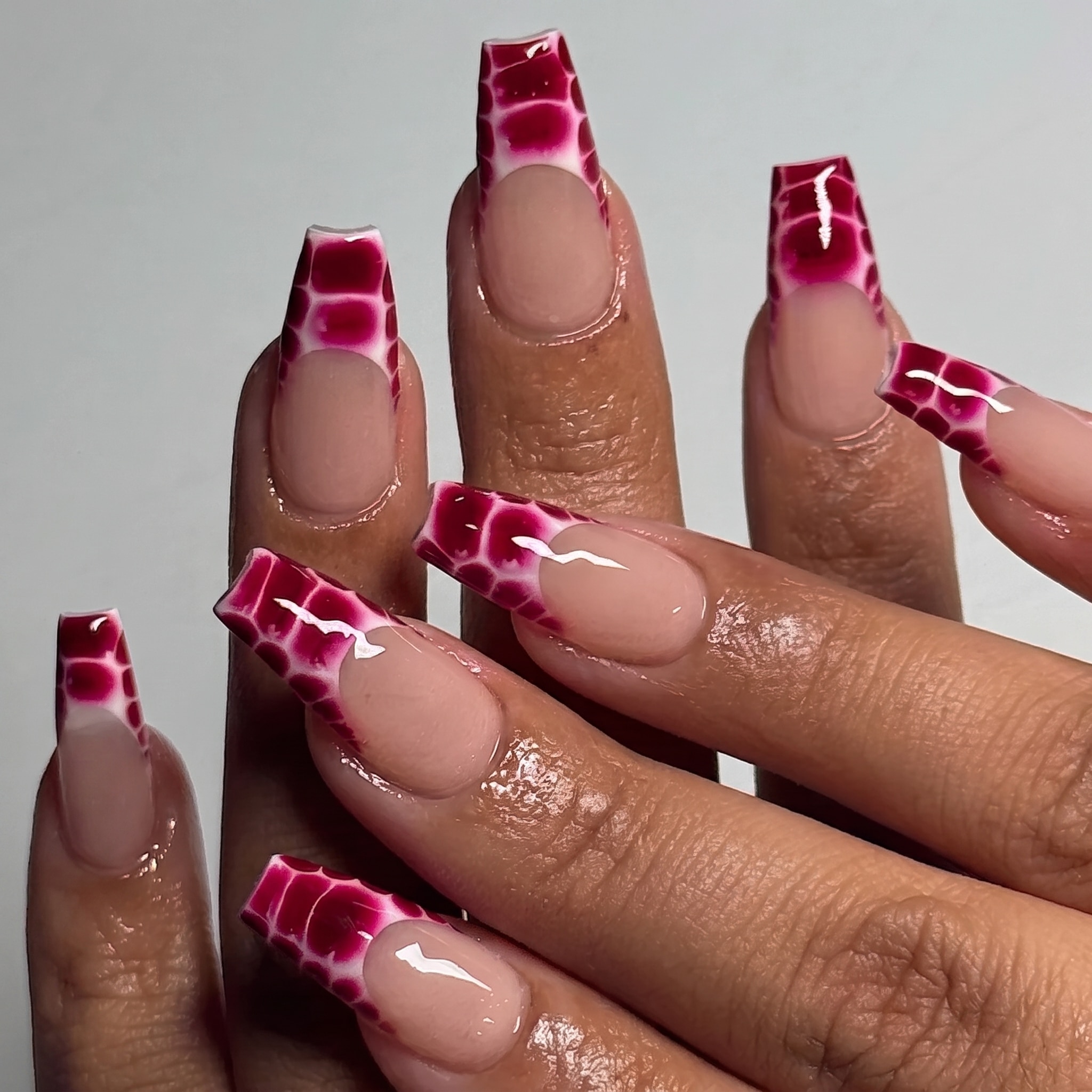 butter yellow avant garde french tips with glossy nude almond nails