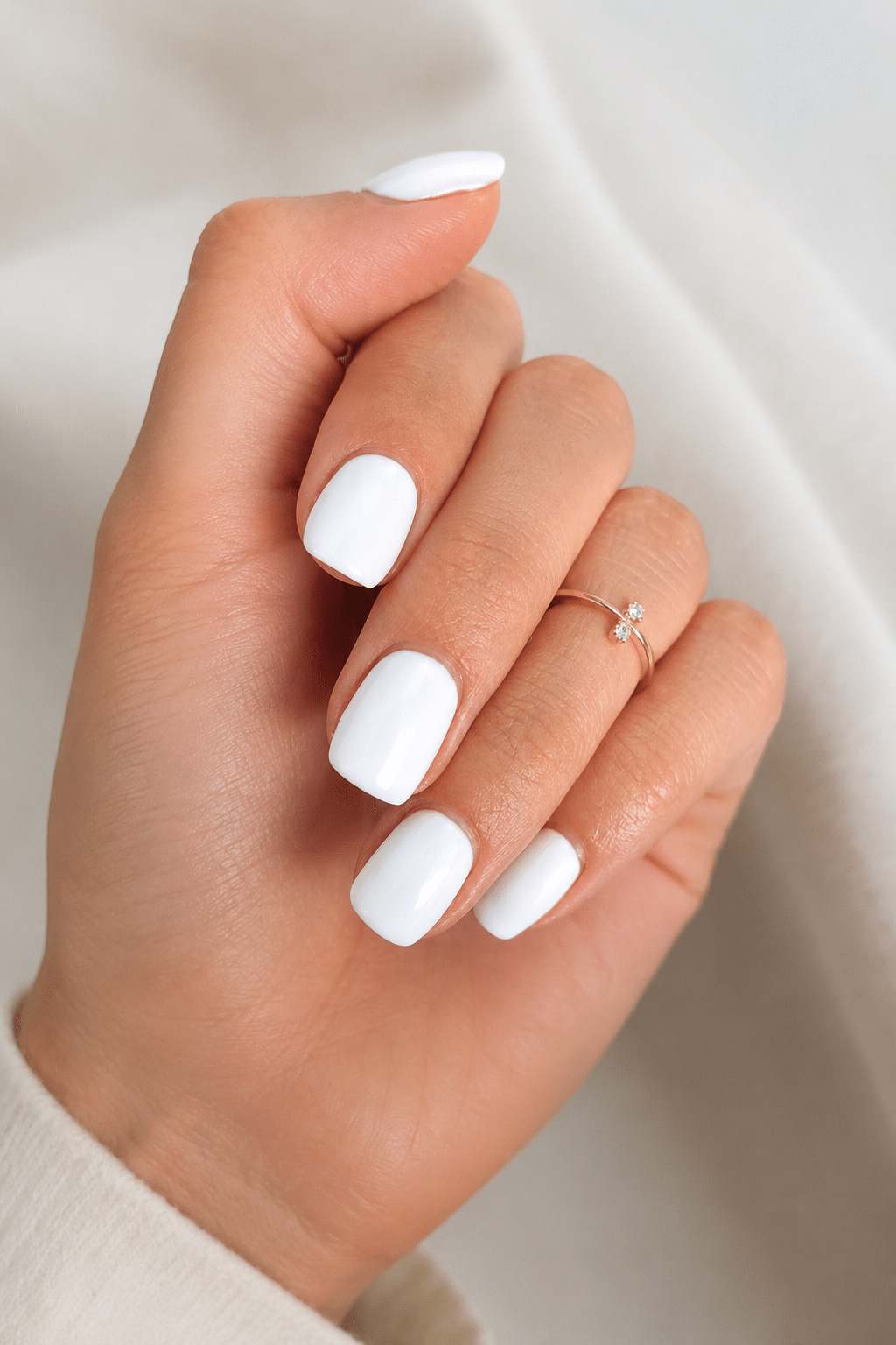 Glossy white wedding press ons with clean bridal manicure finish