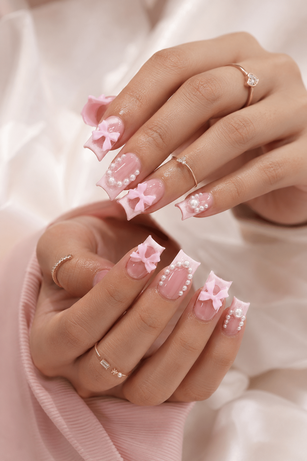 Pink bow square press on nails with a glossy feminine manicure design