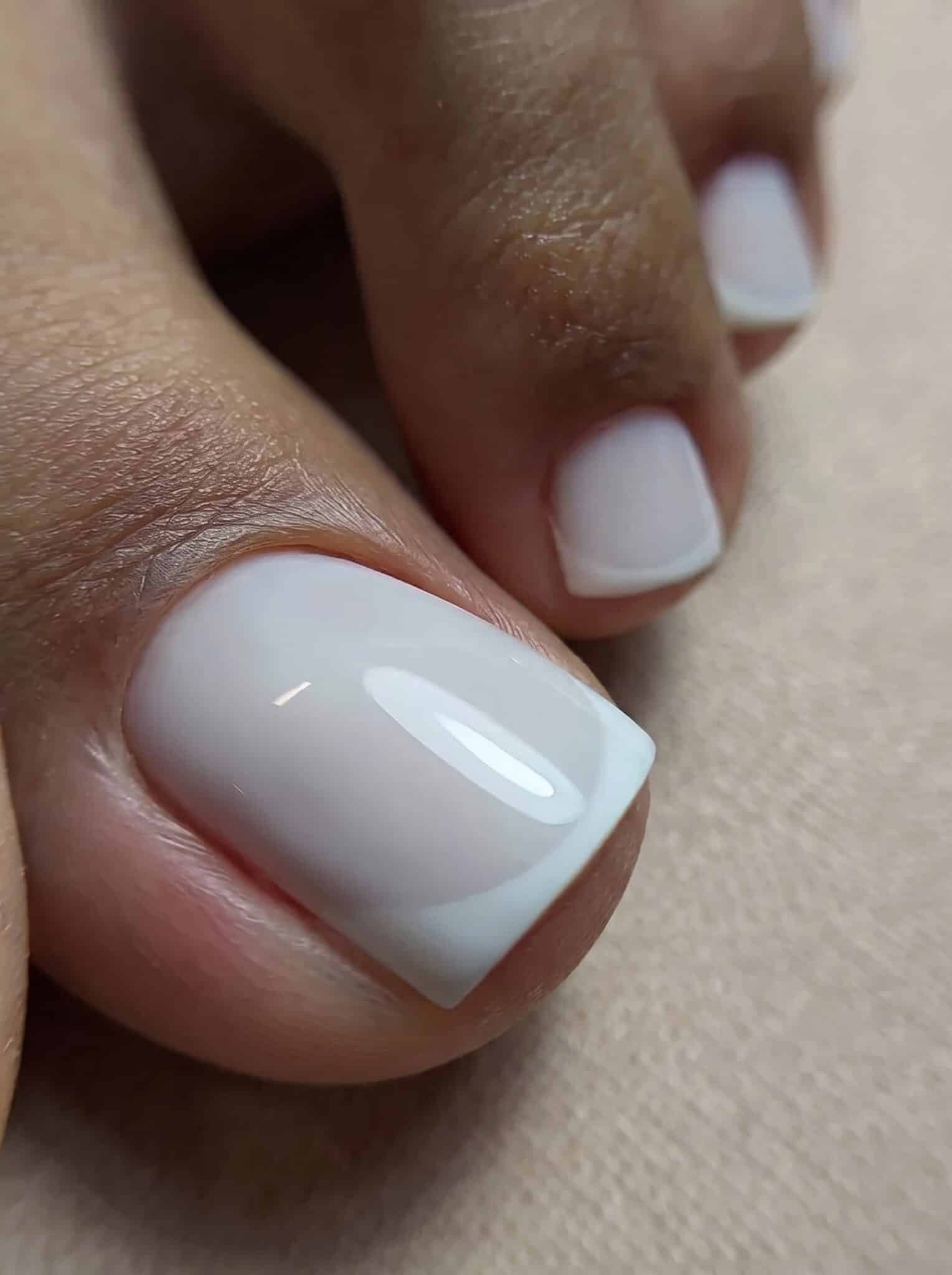 sandal ready french tip toes with glossy white pedicure and summer sandals
