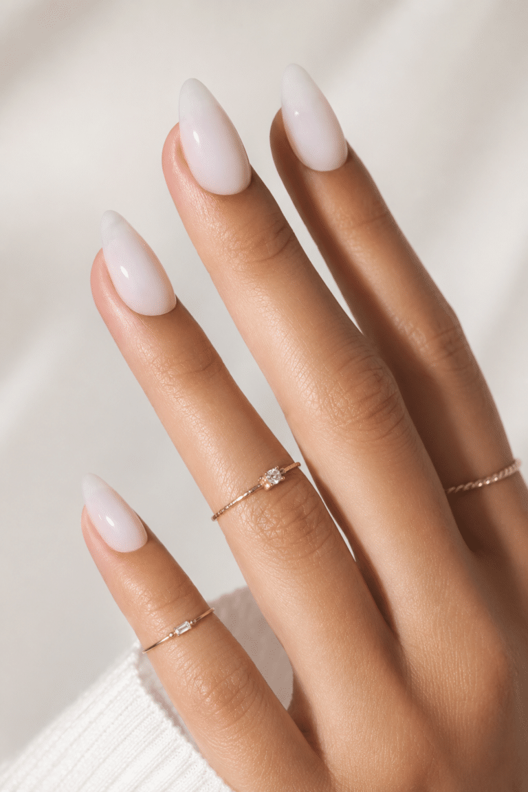Sheer milk short almond press on nails with a minimal clean girl finish