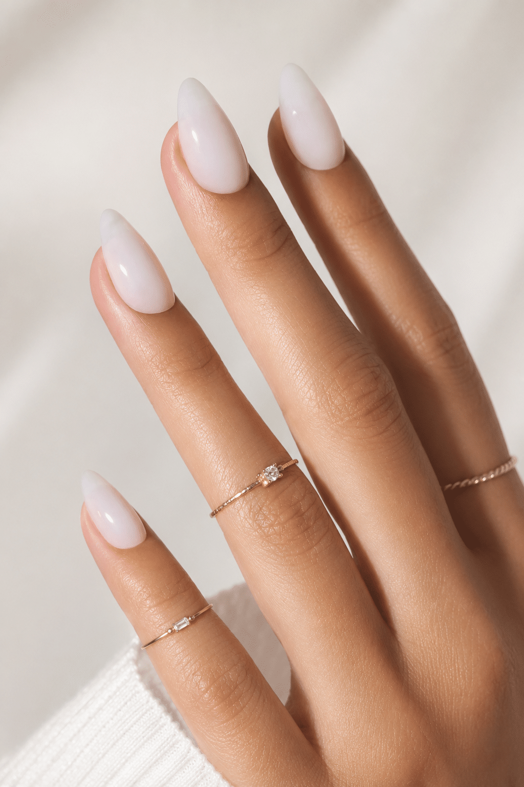 Sheer milk short almond press on nails with a minimal clean girl finish