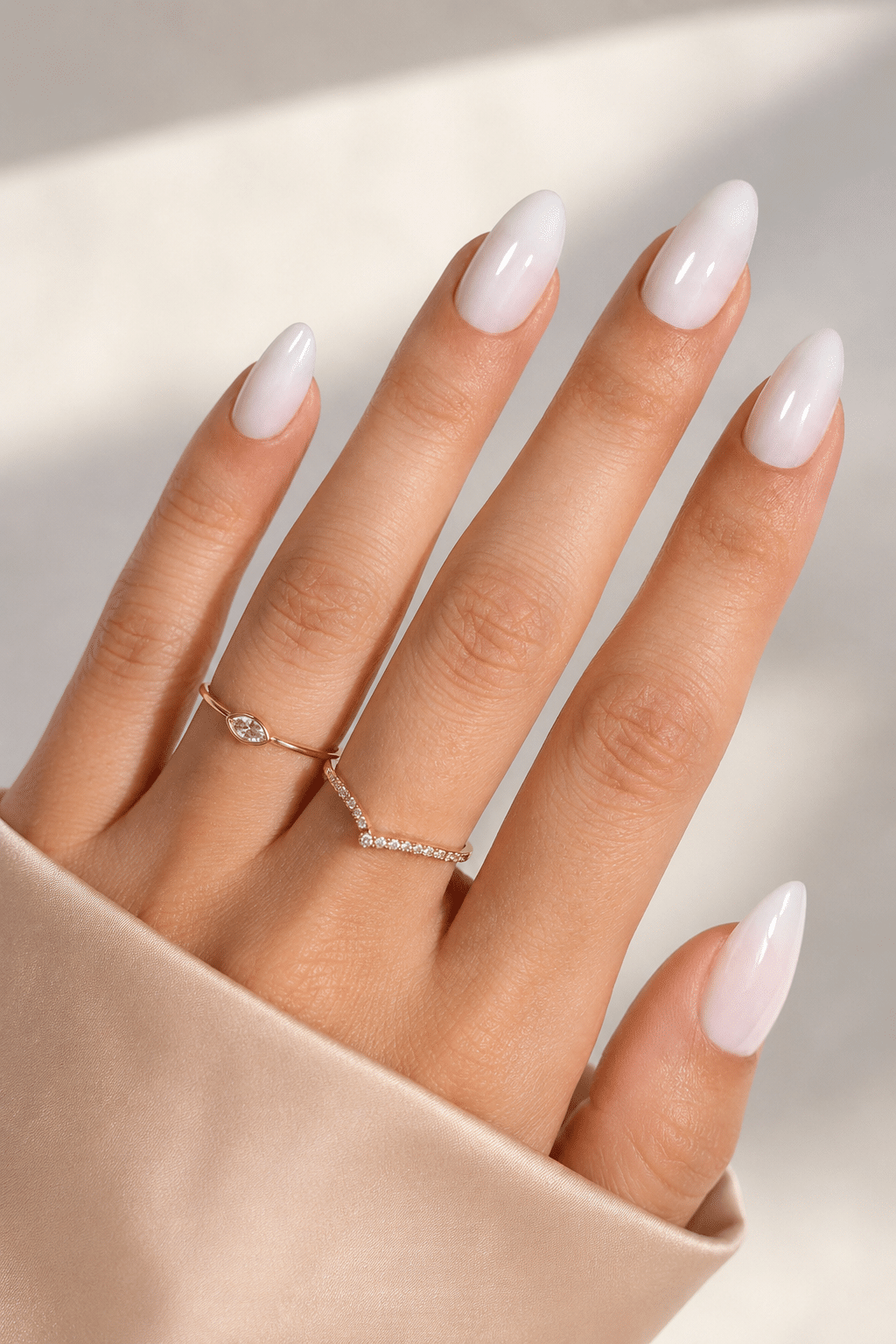 Soft ombre milky almond press on nails with a sheer white finish