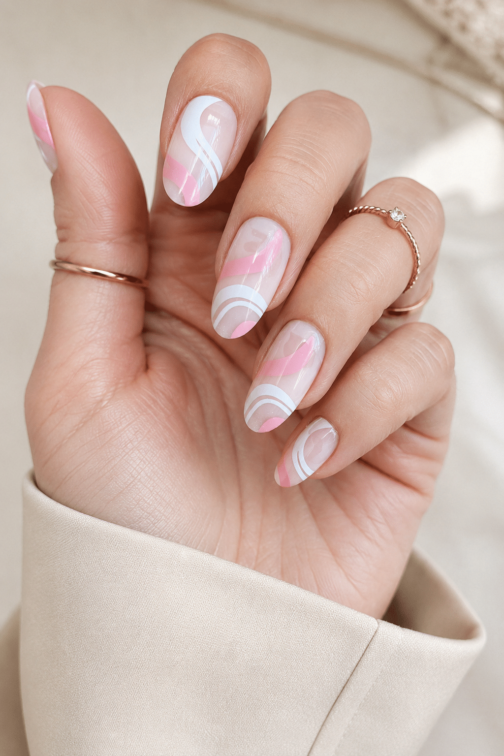 White glossy oval nails with clean rounded manicure finish