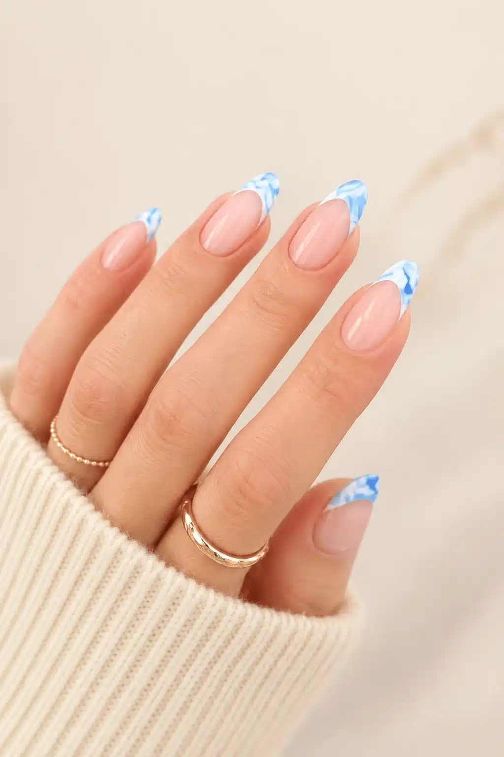 French Tip Nail Polish: Best Colors, Formulas & DIY Guide 5 Pastel blue French tip nail polish on almond nails