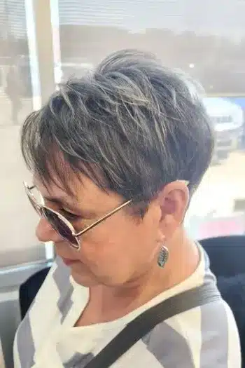 Dimensional Layered Pixie With Bangs haircut for women over 60