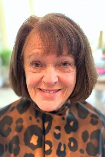 34 Elegant Short Hairstyles for Women Over 70 with Fine Hair 27 Classic Short Bob With Bangs for women over 70 with fine hair