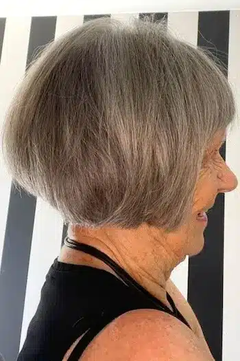 34 Elegant Short Hairstyles for Women Over 70 with Fine Hair 6 Rounded Short Bob With Light Bangs for women over 70 with fine hair