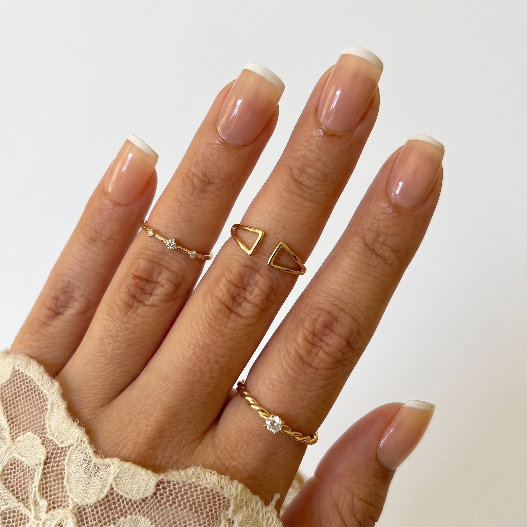 Sheer glossy oval press-ons with a soft nude base