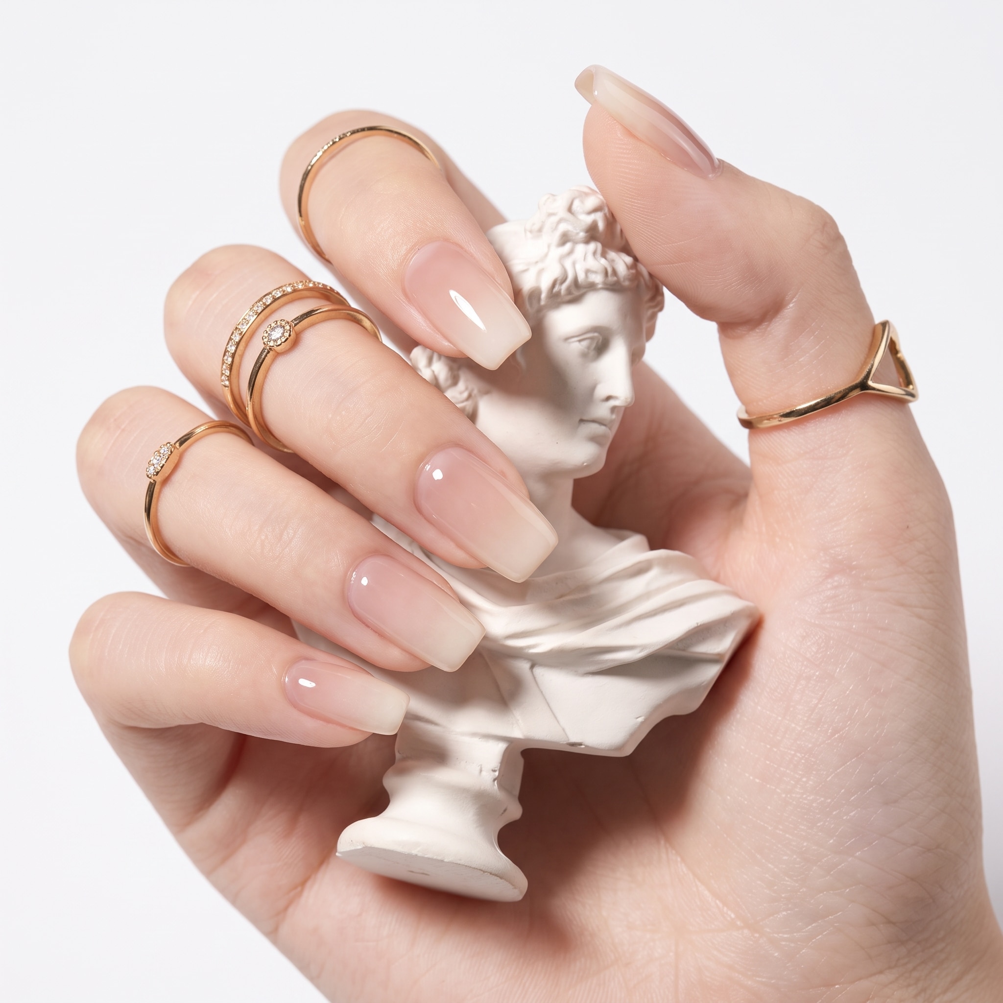 Soft white ombré press-ons with a clean salon-style fade